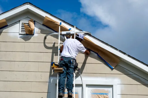 Masking windows on a Sunset Park house